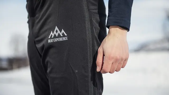 Heat Experience Heated Knee Pants S Slitesterk sort varmebukse med glidelås 