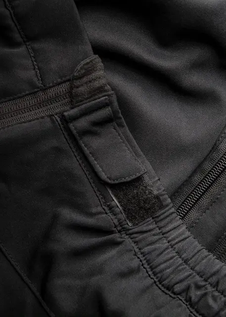 Heat Experience Heated Knee Pants S Slitesterk sort varmebukse med glidelås 